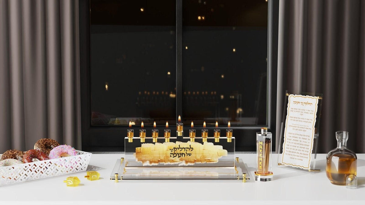 Standing Chanukah brachos card beside a Feldart menorah